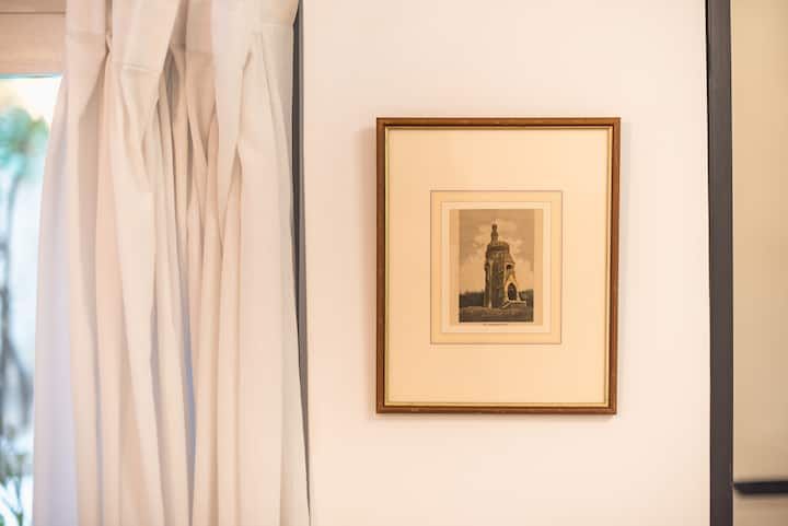 A framed engraving of the Temple of Olympian Zeus.