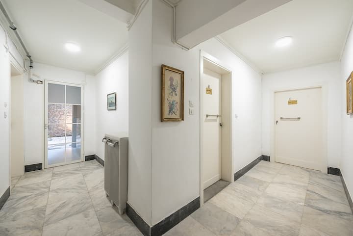Apartment Δ2, at the end of the corridor.